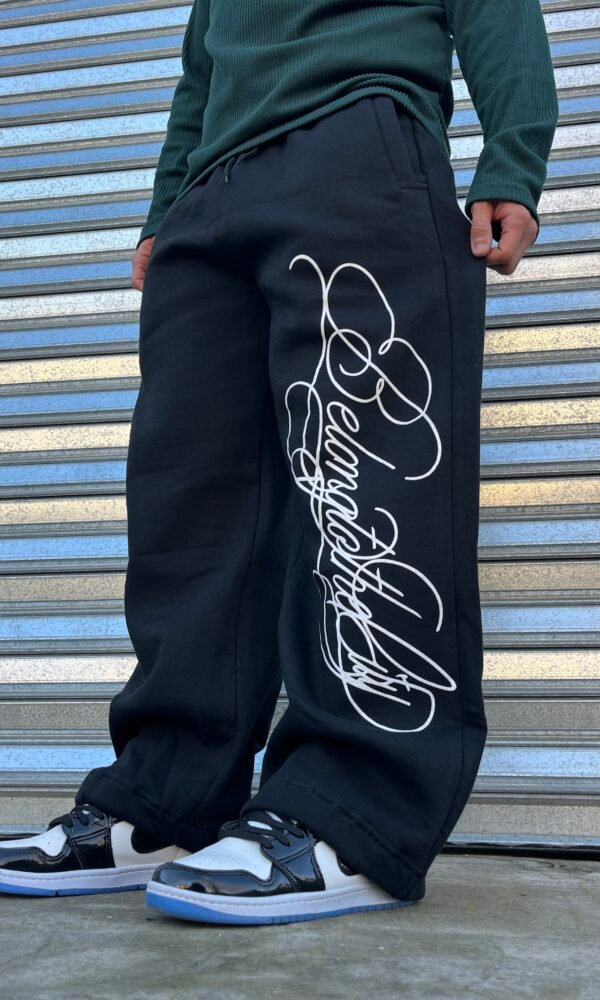 Jogging frisado negro Belong